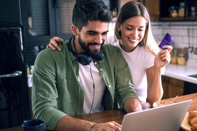 Zenus Bank Happy Couple Using Card